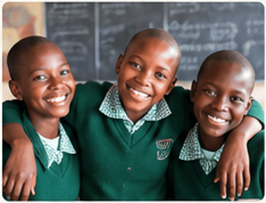 Girls holding sanitary supplies